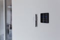 Control panel, air conditioning and heating system of the house, on a white wall, smart home Royalty Free Stock Photo