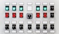 Control panel of industrial equipment with name plates, switches and buttons