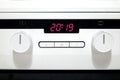 Control panel of modern white kitchen electric stove Royalty Free Stock Photo