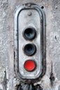 Control panel with a red button