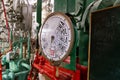 Control panel showing speed settings in a vintage engine room aboard a historic ship during a guided tour Royalty Free Stock Photo