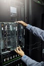 Control room, hardware or hands of technician fixing online cybersecurity glitch, machine or servers system. IT support Royalty Free Stock Photo