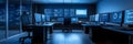Control room with multiple computer monitors and screens Royalty Free Stock Photo