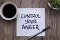 Control your anger, text words typography written on paper against wooden background, life and business motivational inspirational