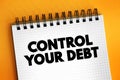 Control Your Debt text on notepad, concept background Royalty Free Stock Photo