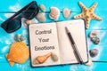 Control your emotions text in notebook with Few Marine Items Royalty Free Stock Photo