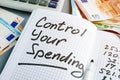 Control your spending. Budgeting book and euros