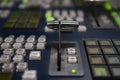 Broadcast television switcher in news studio with blur background. Royalty Free Stock Photo