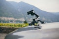 Camera gimbal on the car steadicam keeps on suckers on the auto car Royalty Free Stock Photo