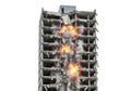 Controlled demolition of a high rise structure with explosions and debris falling Royalty Free Stock Photo