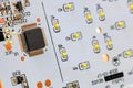 Controller module on LED light module board, electronic circuit panel with surface mount diodes on gray PCB Royalty Free Stock Photo