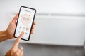 Controlling heating with a smart phone at home