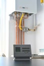 Controlling temperature of a domestic gas boiler with wireless device