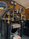 Controls on the footplate of a vintage steam locomotive