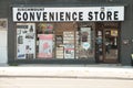 tor, canada - august 1, 2023: convenience store with road street in front, white and black, close up. ph
