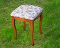 Convenient stool with the seat upholstered with a gobelin.