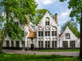 Convent garden of Begijnhof, Beguinage, in Bruges, West Flanders, Belgium