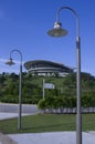 Convention Center on hill and two lamp posts Royalty Free Stock Photo