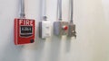 fire alarm pull stations and emergency switch on the wall Royalty Free Stock Photo