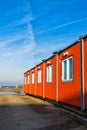 Conventional shipping containers housing