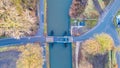 Convergence of Nature and Civilization: An Aerial View of a Canal Lock and Road Intersection Royalty Free Stock Photo