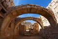 Converging ancient stone arches