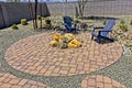 Conversation Area With Two Arm Chairs And Firepit On Red Pavers Royalty Free Stock Photo