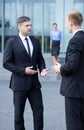 Conversation in front of business centre Royalty Free Stock Photo