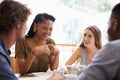 Conversation, laugh and friends in restaurant together for bonding, fun social gathering and study. Coffee shop, brunch Royalty Free Stock Photo