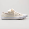 Converse Chuck Taylor All Star Big Eyelets OX beige and white sneaker Royalty Free Stock Photo