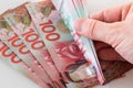 Converted 100 dollar bills from New Zealand Royalty Free Stock Photo
