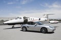 Convertible And Private Jet Royalty Free Stock Photo