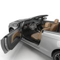 Convertible sports car isolated on a white background. Door opened. 3D illustration