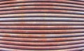 Convex light and red rusty iron pipe background texture Royalty Free Stock Photo