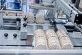 conveyor automatic tape for the production of useful whole-grain extruder crispbread. Royalty Free Stock Photo