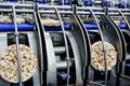 Conveyor automatic tape for the production of useful whole-grain extruder crispbread. Royalty Free Stock Photo