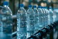 Conveyor belt with bottles of drinking water at a modern beverage plant concept Royalty Free Stock Photo