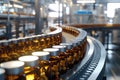 Conveyor belt carrying multiple bottles, possibly in a factory or packaging setting Royalty Free Stock Photo