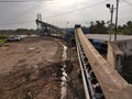 The conveyor belt at jetty for loading cargo Royalty Free Stock Photo