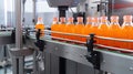 Conveyor belt, juice in bottles on beverage plant or factory interior, industrial production line, selective focus. Royalty Free Stock Photo