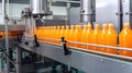 Conveyor belt, juice in bottles on beverage plant or factory interior, industrial production line, selective focus. Royalty Free Stock Photo