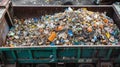 Conveyor belt at a recycling plant transporting a large amount of plastic bottles for processing. Royalty Free Stock Photo