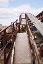 Conveyor belt of stone crushing plant Royalty Free Stock Photo