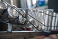 Conveyor for bottling beer in aluminum cans. Close up Royalty Free Stock Photo