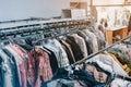 Conveyor with hangers of dry-cleaned clothes. Dry cleaning background Royalty Free Stock Photo