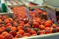 Conveyor line of calibrating and packaging fruits with peaches