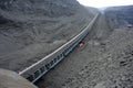 Conveyor system for transporting coal. Royalty Free Stock Photo