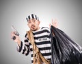 Convict criminal in striped uniform Royalty Free Stock Photo