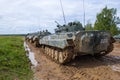 Convoy of BMP-3 at the exit to the landfill