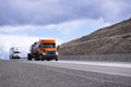 Convoy of the big rigs semi trucks with tank and dry van semi tr Royalty Free Stock Photo